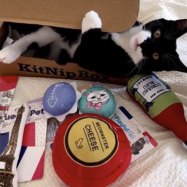 Recipient opening a monthly box in front of the gifter